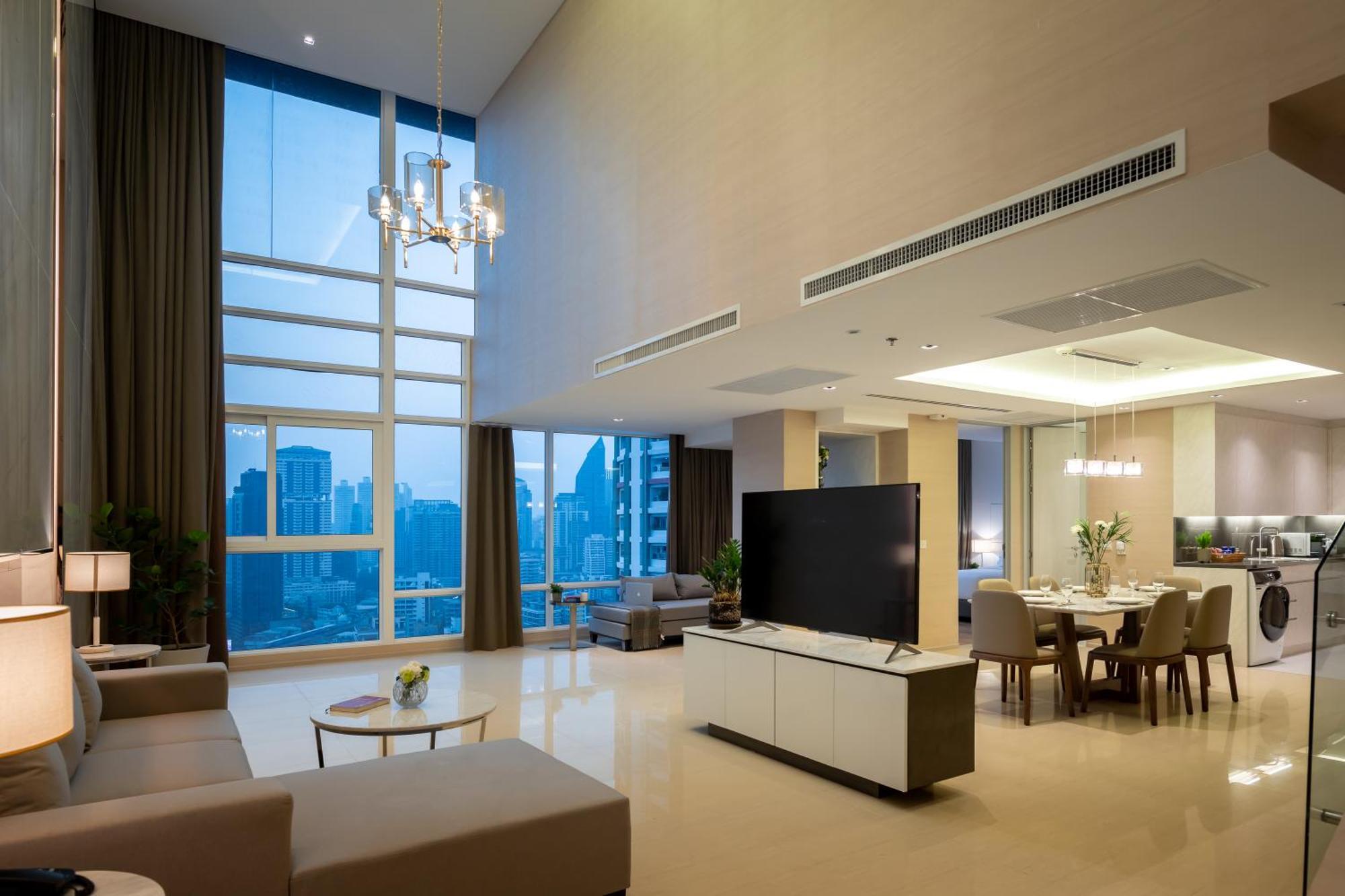 Jasmine 59 Hotel Бангкок Экстерьер фото A living room in a condominium