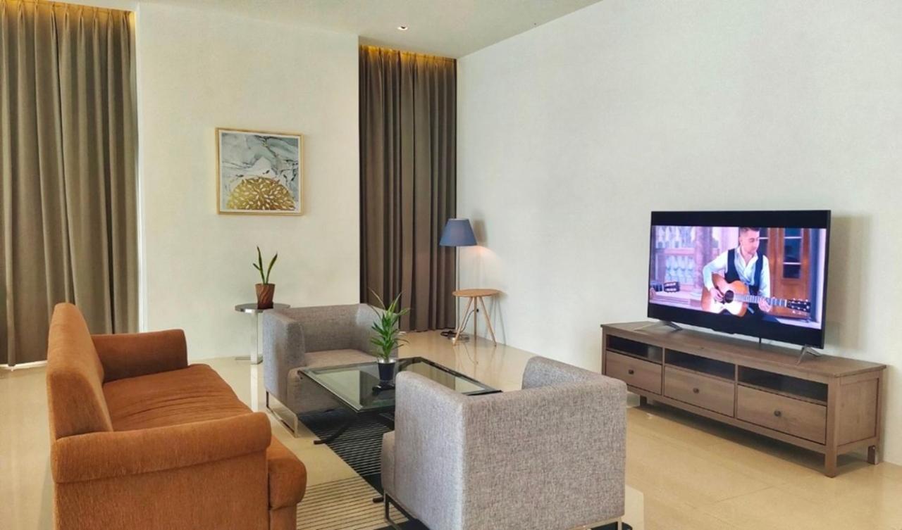 Jasmine 59 Hotel Бангкок Экстерьер фото A living room in a serviced apartment in Ho Chi Minh City, Vietnam